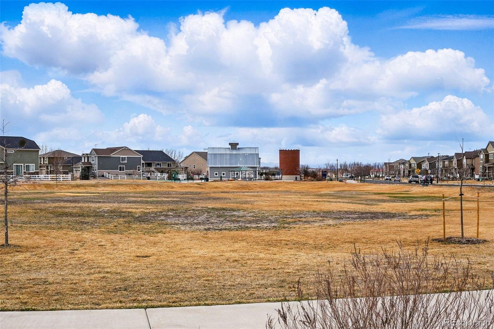 745 Penstemon Drive Henderson, CO 80640 - Photo 29 of 38 a view of an ocean and beach