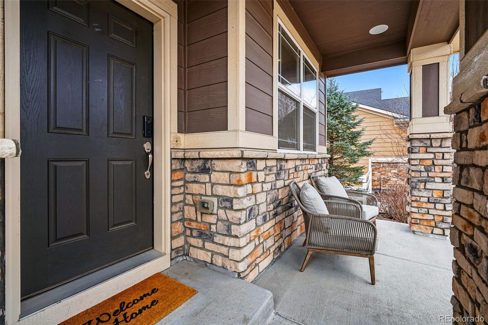 745 Penstemon Drive Henderson, CO 80640 - Photo 4 of 38 a outdoor space with balcony and furniture