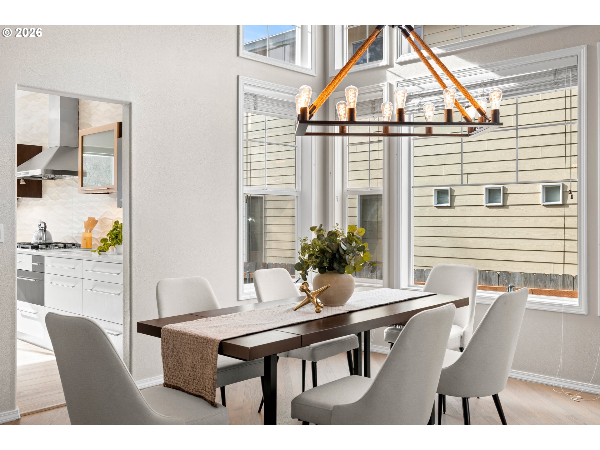 15542 Northwest Andalusian Way Portland, OR 97229 - Photo 11 of 48 a view of a dining room with furniture and window