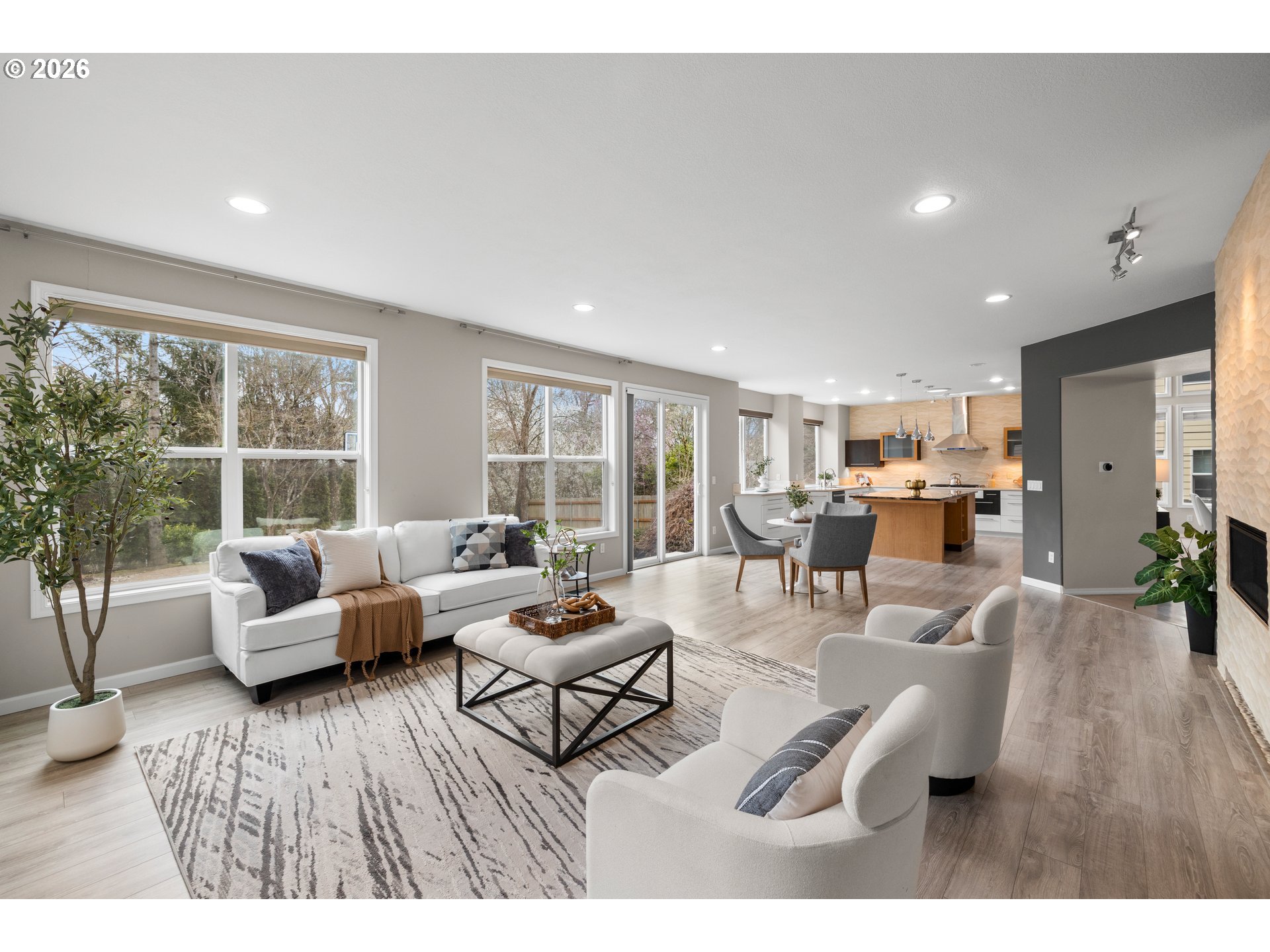 15542 Northwest Andalusian Way Portland, OR 97229 - Photo 14 of 48 a living room with furniture and wooden floor