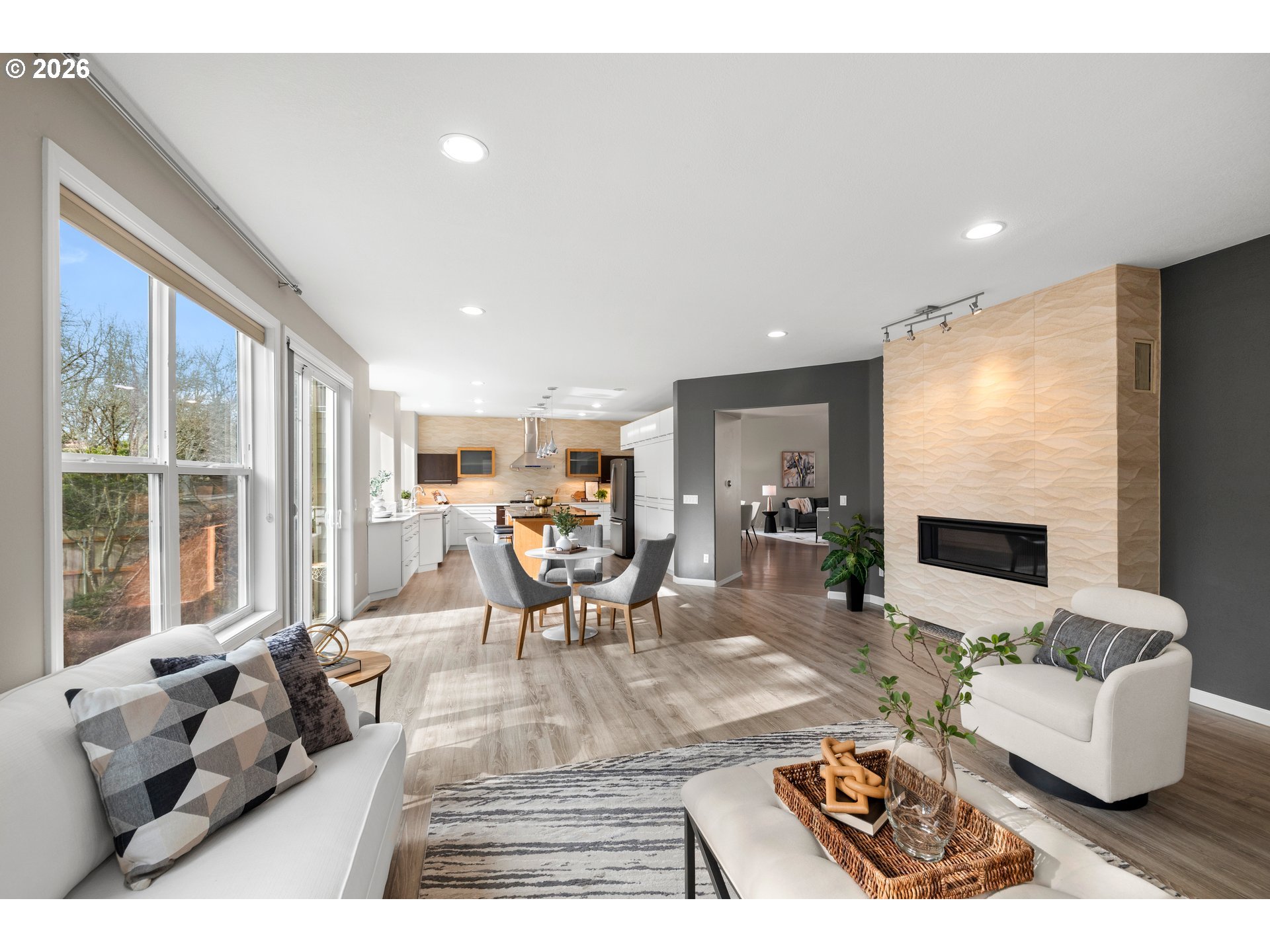 15542 Northwest Andalusian Way Portland, OR 97229 - Photo 16 of 48 a living room with furniture and a large window