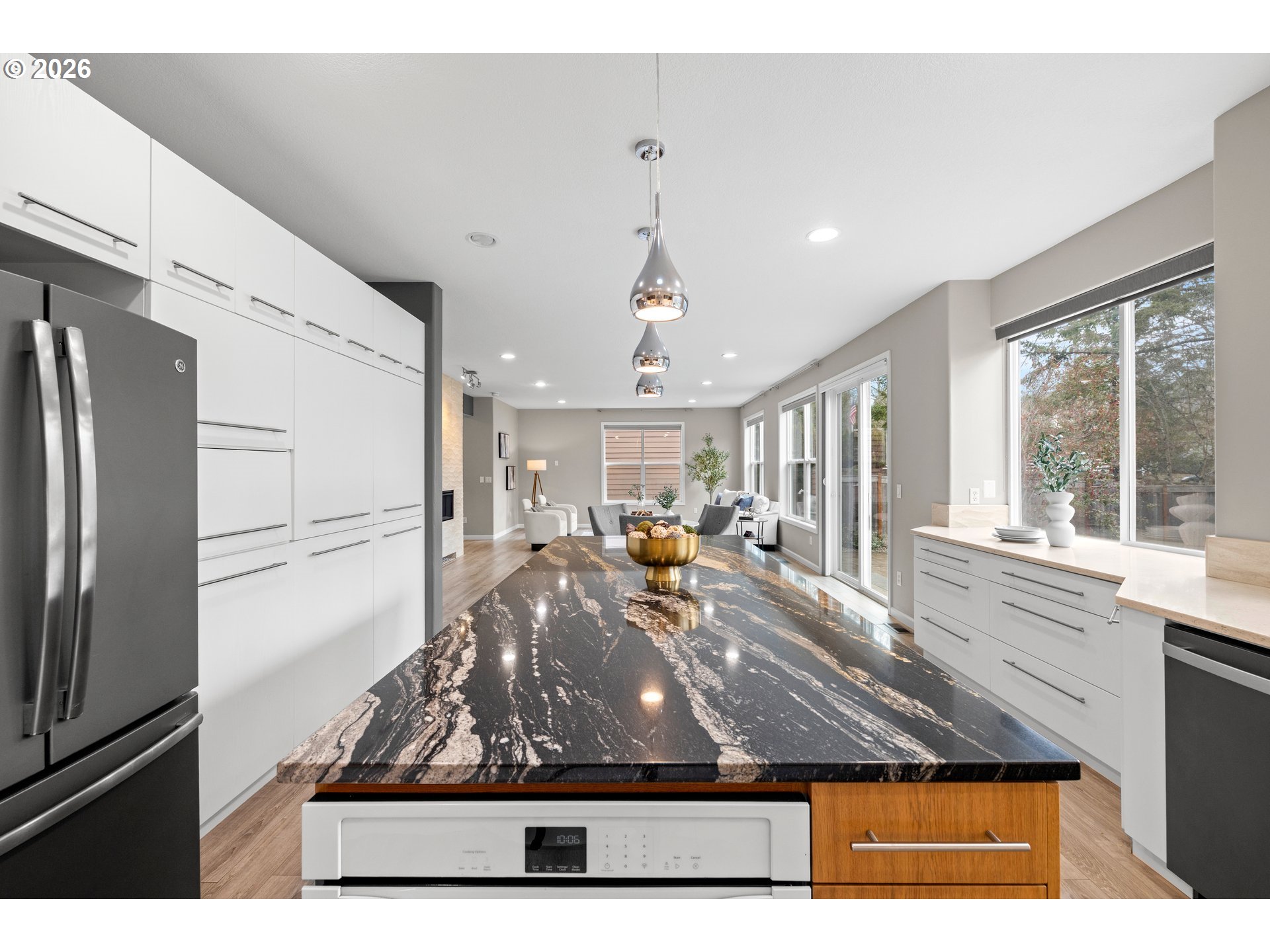 15542 Northwest Andalusian Way Portland, OR 97229 - Photo 25 of 48 a view of a very nice looking living room with a large window