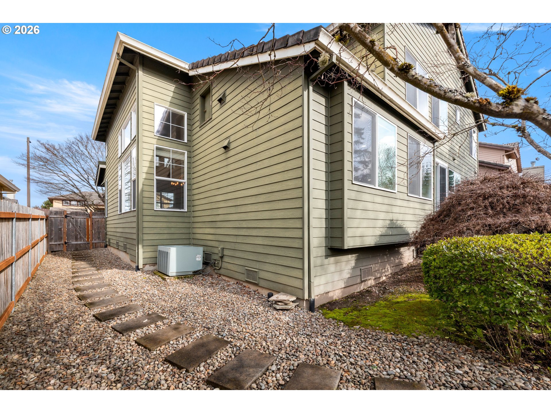 15542 Northwest Andalusian Way Portland, OR 97229 - Photo 46 of 48 a view of a house with a yard
