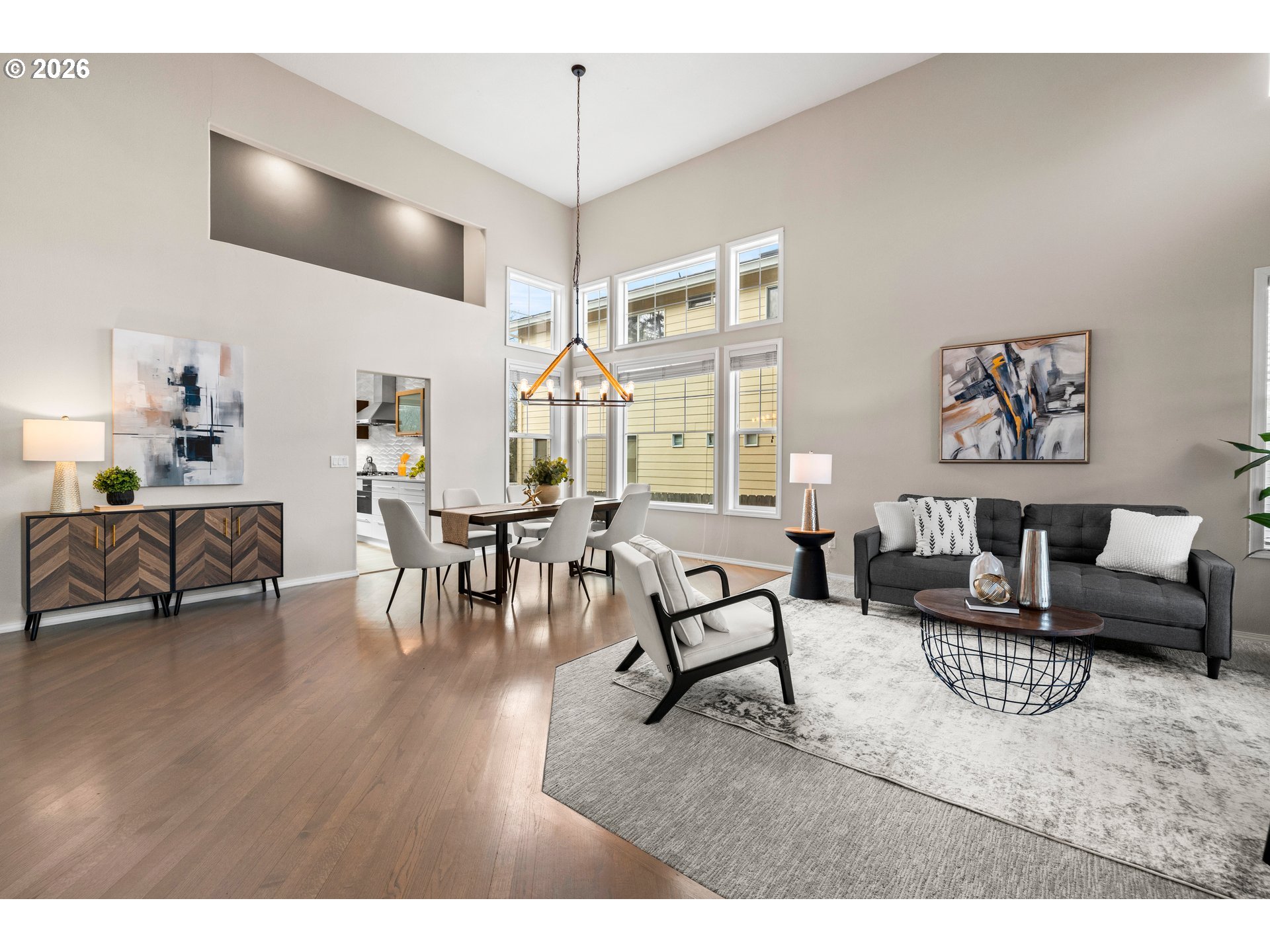 15542 Northwest Andalusian Way Portland, OR 97229 - Photo 6 of 48 a living room with furniture and a large window