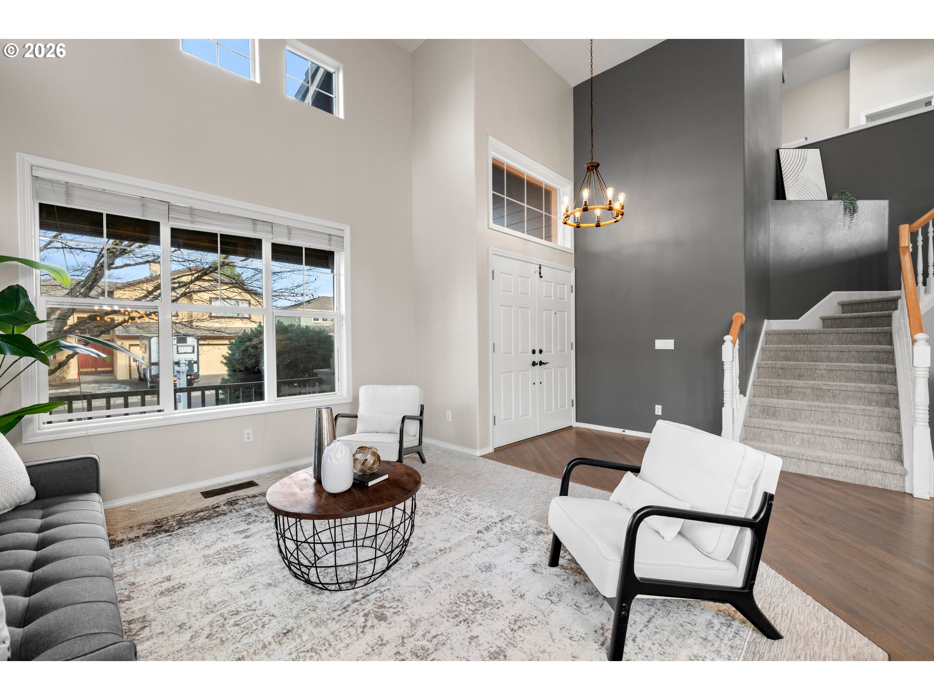 15542 Northwest Andalusian Way Portland, OR 97229 - Photo 9 of 48 a living room with furniture and a window