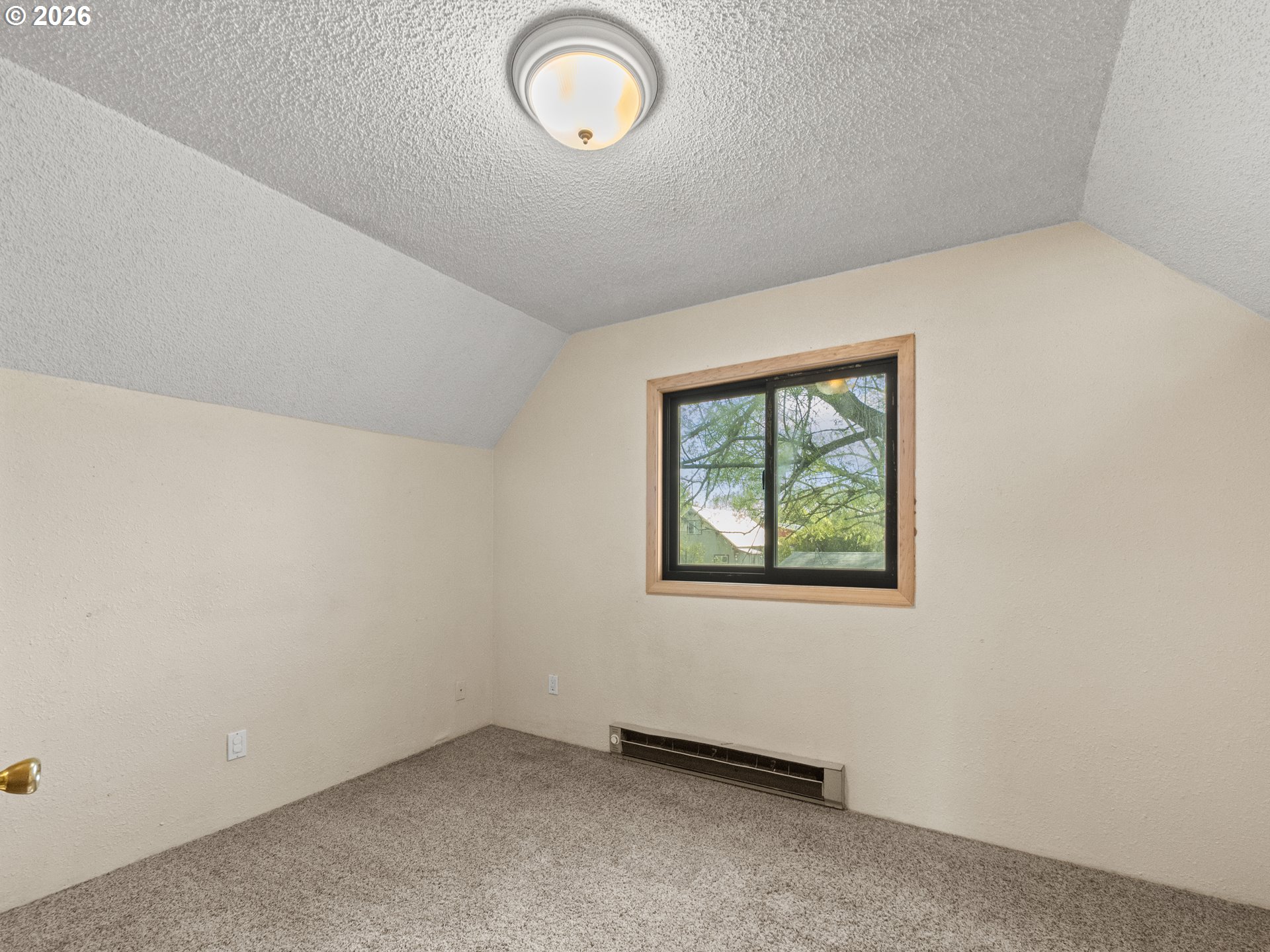 604 Mildred Street Enterprise, OR 97828 - Photo 15 of 37 an empty room with windows