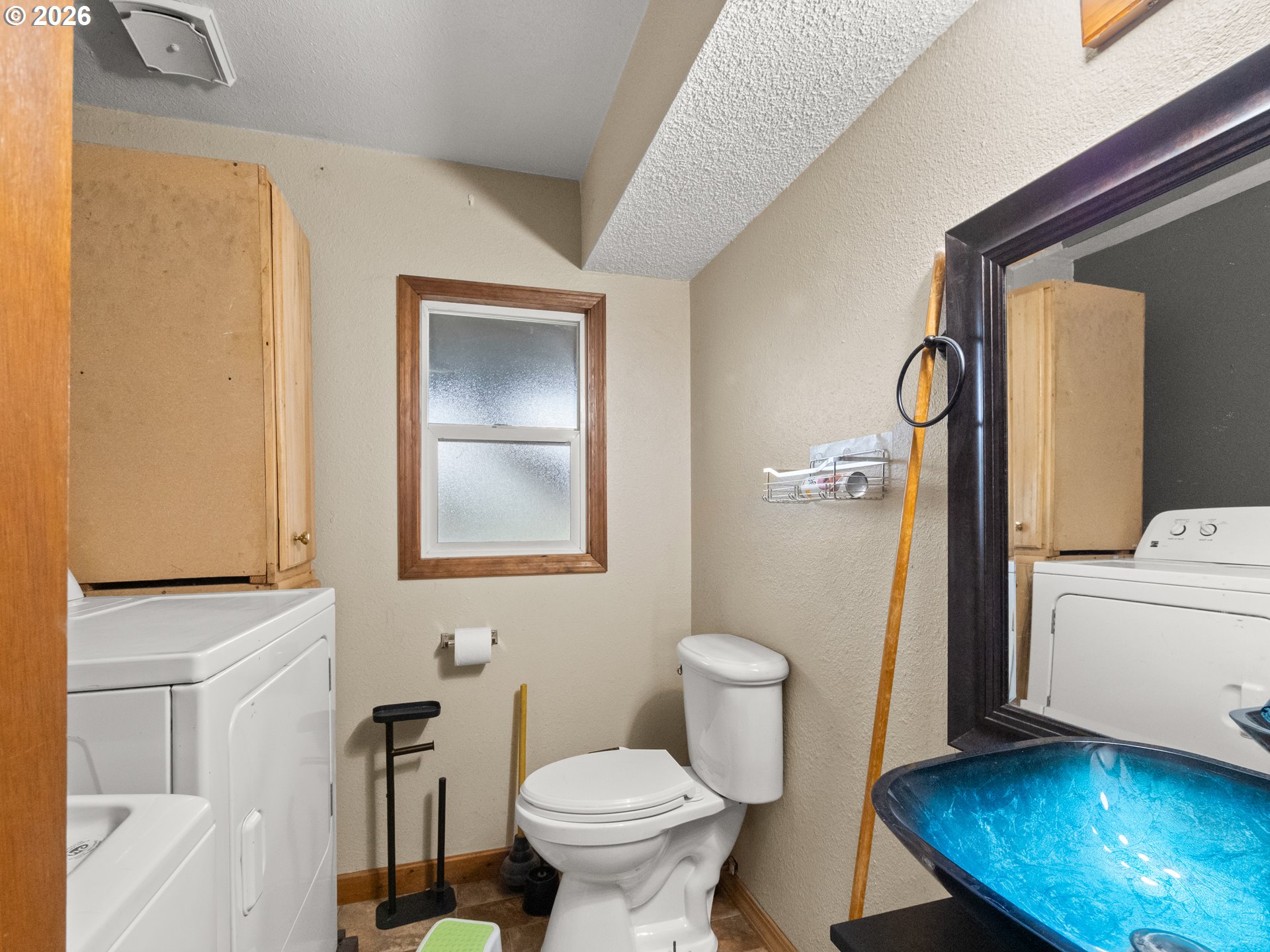 604 Mildred Street Enterprise, OR 97828 - Photo 5 of 37 a bathroom with a toilet and a sink