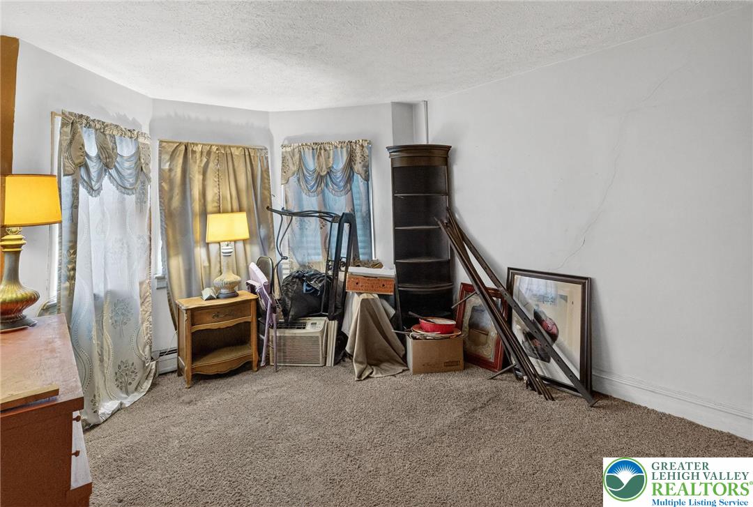 19 East Patterson Street Lansford, PA 18232 - Photo 11 of 17 a view of livingroom with furniture and windows