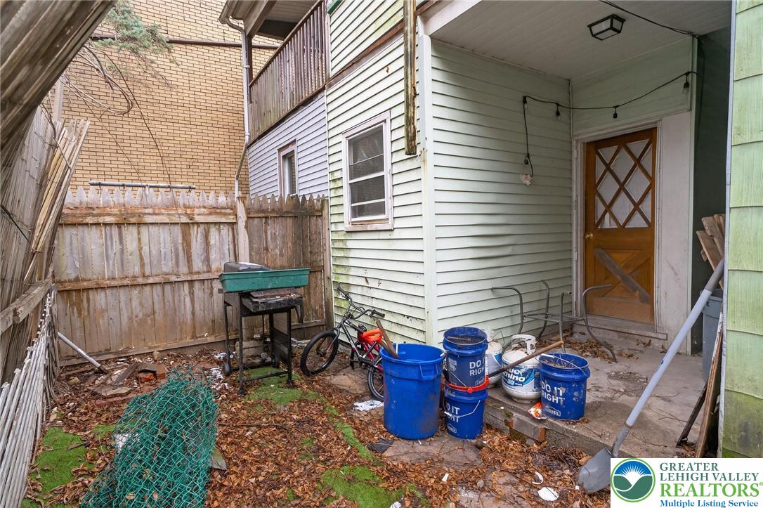 19 East Patterson Street Lansford, PA 18232 - Photo 15 of 17 a backyard of a house with outdoor seating