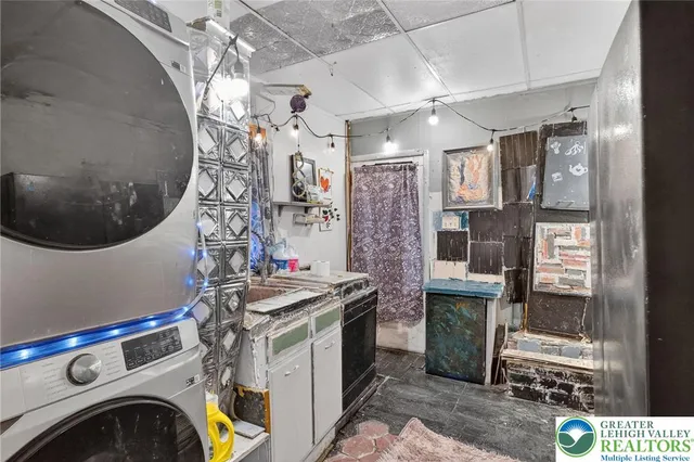 a utility room with dryer and washer