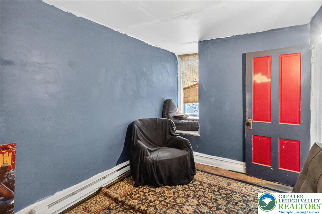 19 East Patterson Street Lansford, PA 18232 - Photo 8 of 17 a living room with furniture and a window