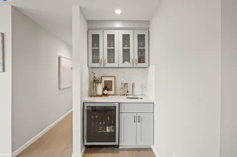 a view of an empty room with a washer and dryer