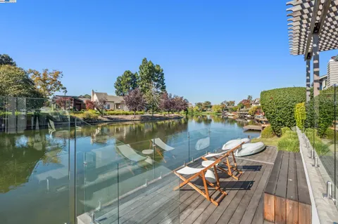 a view of a lake with sitting area