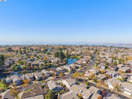 an aerial view of multiple house with outdoor space
