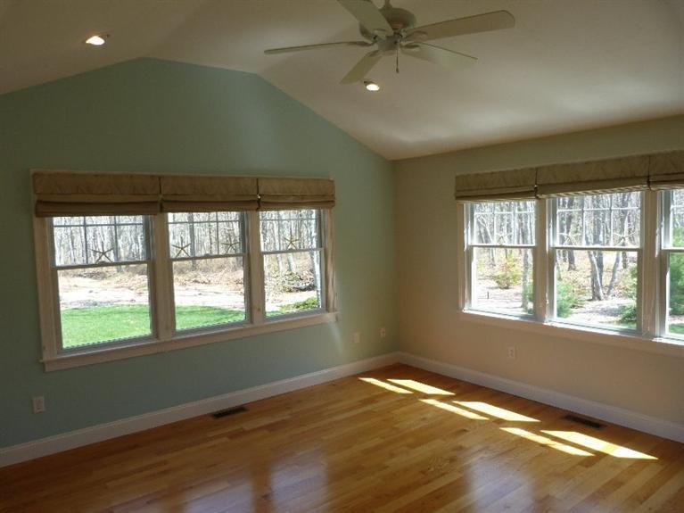 1399 Halls Path Harwich, MA 02645 - Photo 15 of 34 a view of an empty room with wooden floor and a window
