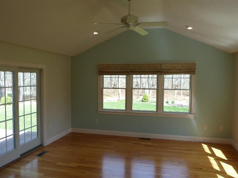 1399 Halls Path Harwich, MA 02645 - Photo 16 of 34 a view of an empty room with wooden floor and a window