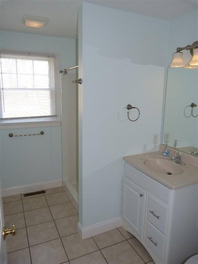 1399 Halls Path Harwich, MA 02645 - Photo 19 of 34 a bathroom with a sink toilet and vanity