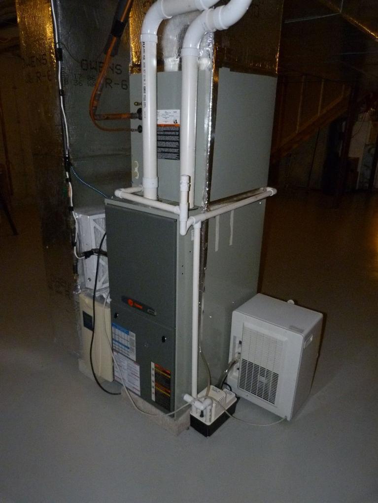 1399 Halls Path Harwich, MA 02645 - Photo 30 of 34 a view of storage and utility room with racks on the wall