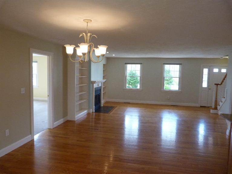 1399 Halls Path Harwich, MA 02645 - Photo 10 of 34 a view of a room with wooden floor and windows