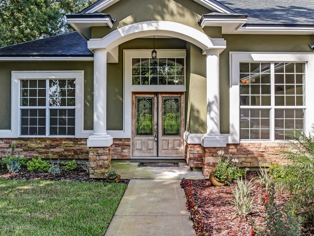 1576 Scott Road Fruit Cove, FL 32259 - Photo 1 of 87 a house view with a outdoor space