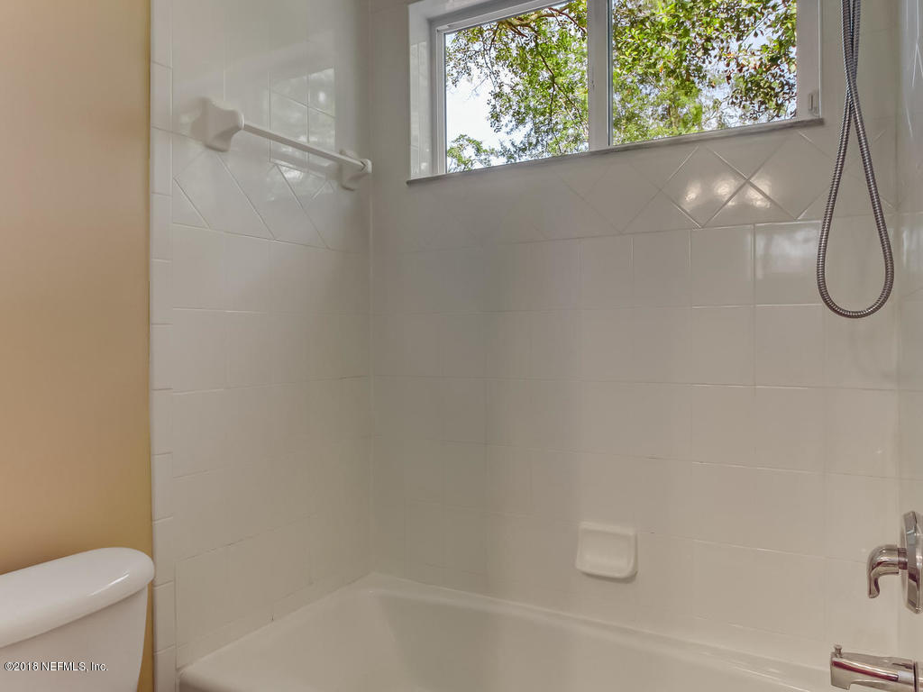 1576 Scott Road Fruit Cove, FL 32259 - Photo 46 of 87 a bathroom with a shower and a toilet