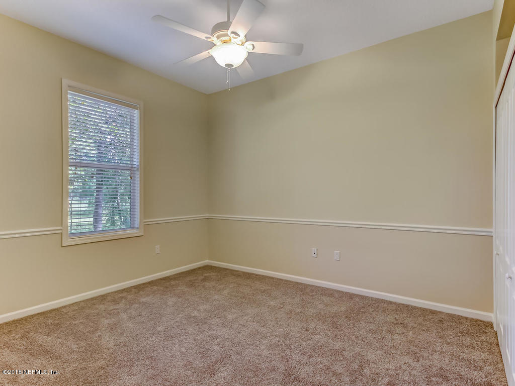 1576 Scott Road Fruit Cove, FL 32259 - Photo 47 of 87 an empty room with a window