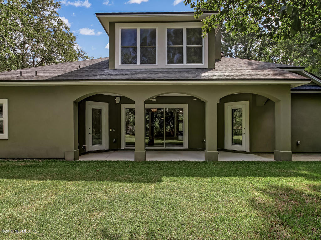 1576 Scott Road Fruit Cove, FL 32259 - Photo 59 of 87 a view of front of a house with a yard