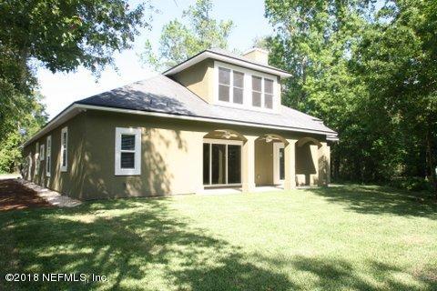 1576 Scott Road Fruit Cove, FL 32259 - Photo 73 of 87 a front view of a house with a yard