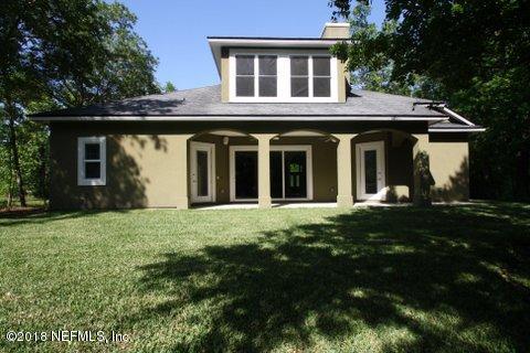 1576 Scott Road Fruit Cove, FL 32259 - Photo 74 of 87 a view of a house with yard and garden