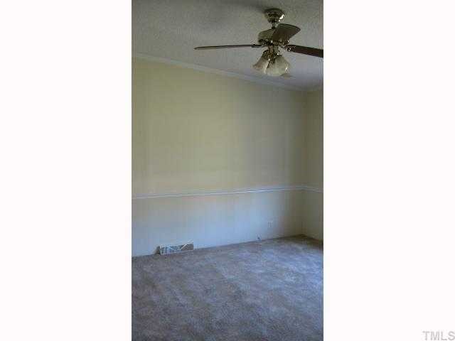 7516 Eagle Run Road Zebulon, NC 27597 - Photo 9 of 11 a view of an empty room
