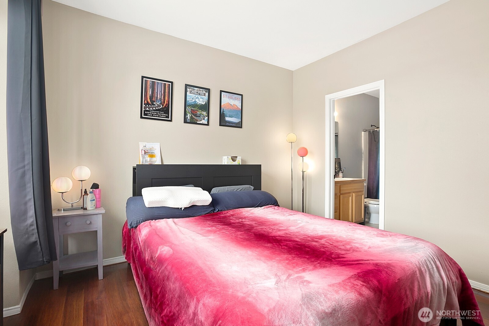 6830 20th Street East, Unit F5 Fife, WA 98424 - Photo 18 of 25 a bedroom with three beds and wooden floor