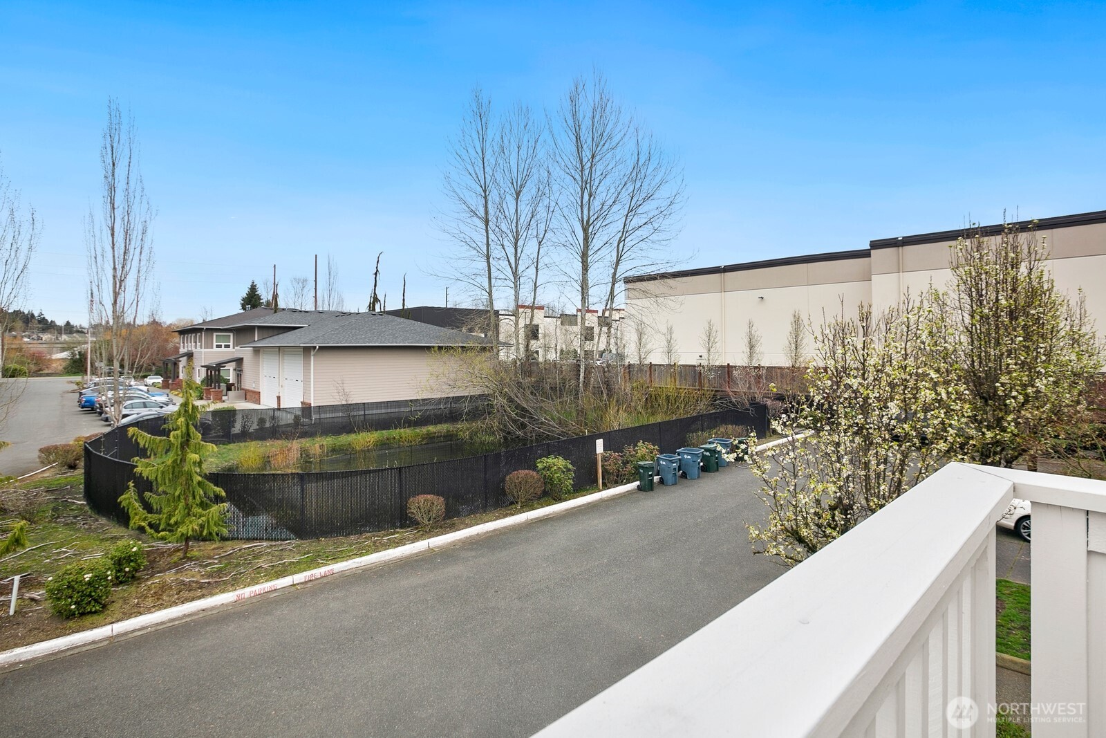 6830 20th Street East, Unit F5 Fife, WA 98424 - Photo 25 of 25 a view of a house with a outdoor space