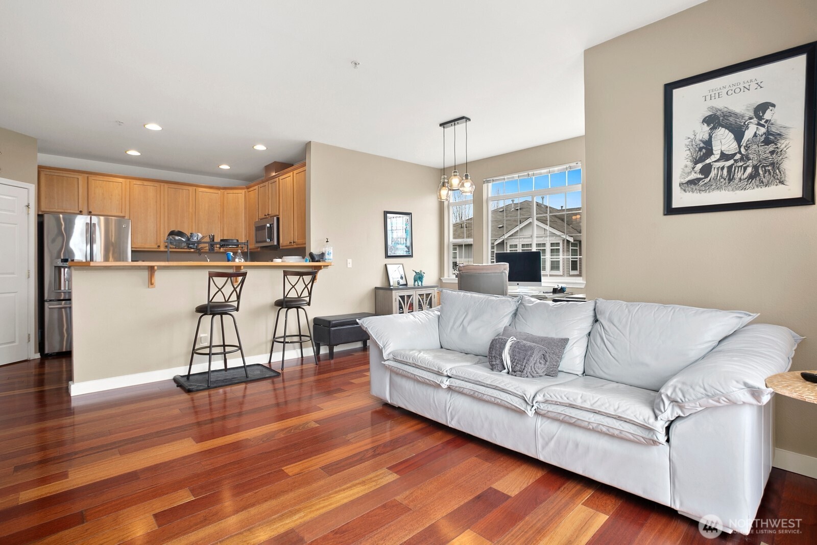6830 20th Street East, Unit F5 Fife, WA 98424 - Photo 5 of 25 a view of kitchen with dining table and chairs