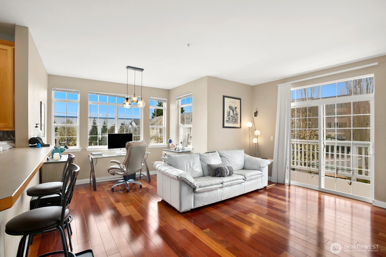 6830 20th Street East, Unit F5 Fife, WA 98424 - Photo 7 of 25 a living room with furniture and a large window