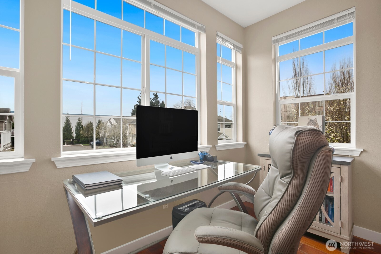 6830 20th Street East, Unit F5 Fife, WA 98424 - Photo 9 of 25 a living room with furniture and a flat screen tv