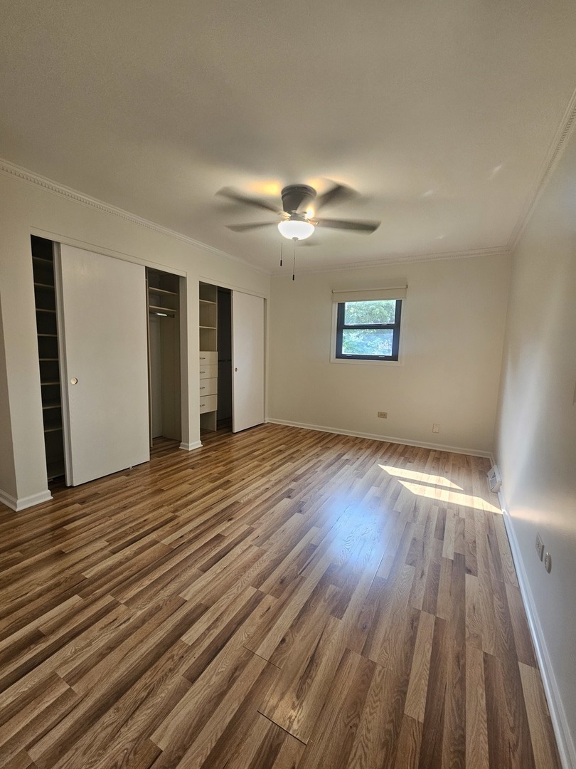 399 Purdue Lane Elgin, IL 60123 - Photo 7 of 24 a view of empty room with wooden floor