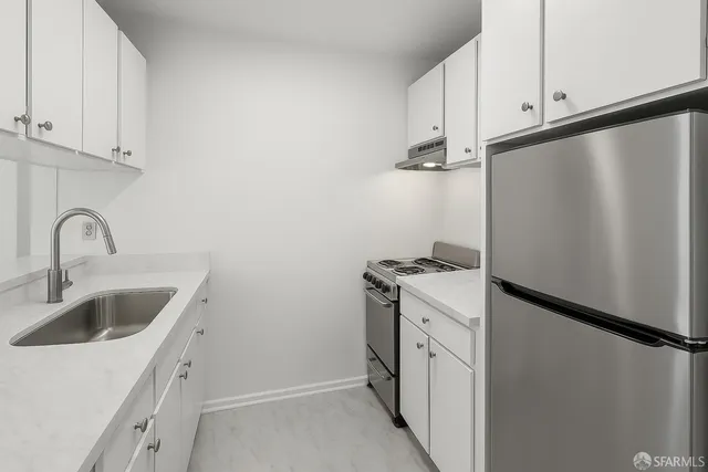 a view of a kitchen with sink