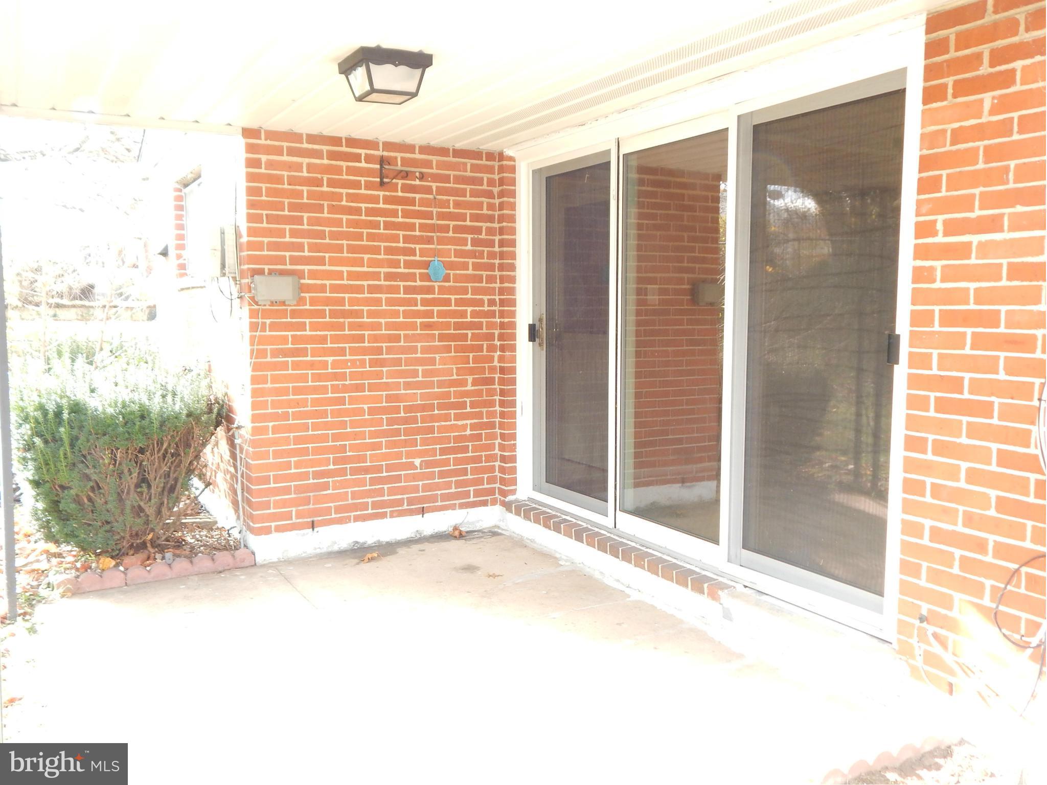 1013 Collwood Road Catonsville, MD 21228 - Photo 13 of 23 Exterior view of Dining Room sliding glass doors