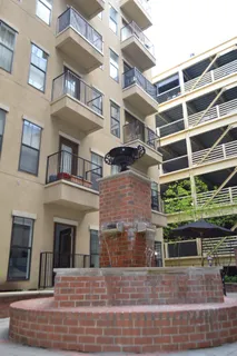 an outdoor space with furniture and umbrella