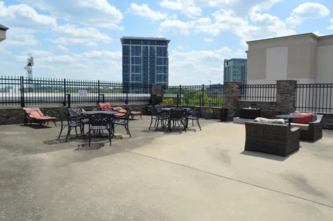 a view of a building with sitting area
