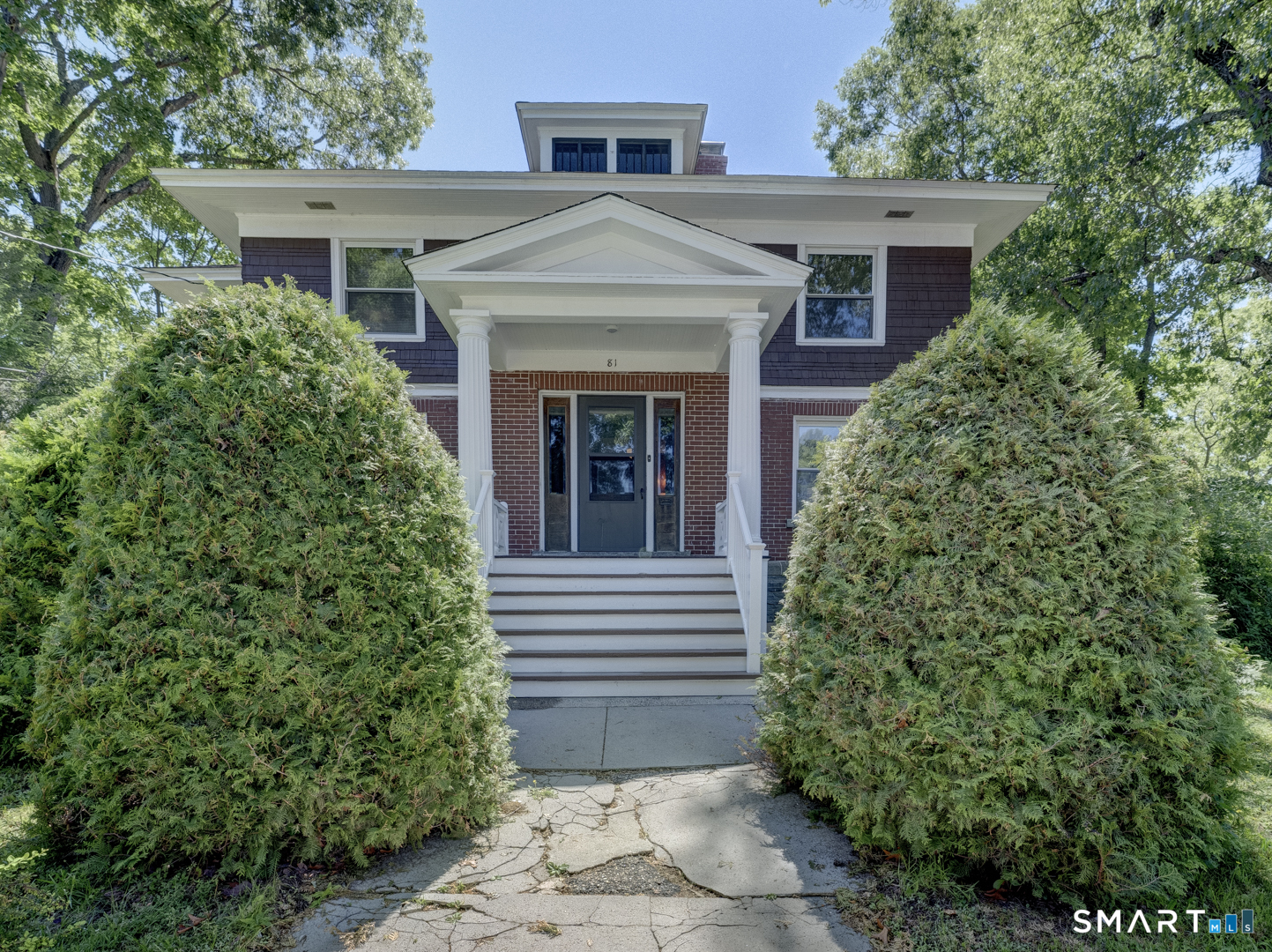 81 Chestnut Street Windham, CT 06226 - Photo 1 of 40 Incredible entry with small, covered porch and benches on both sides inside entry door