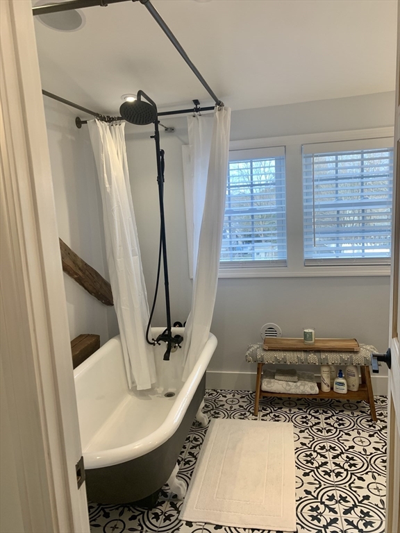 2208 Washington Street Canton, MA 02021 - Photo 13 of 15 a bathroom with a sink toilet and shower