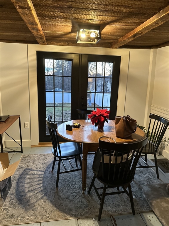 2208 Washington Street Canton, MA 02021 - Photo 5 of 15 a view of a dining room with furniture window and outside view