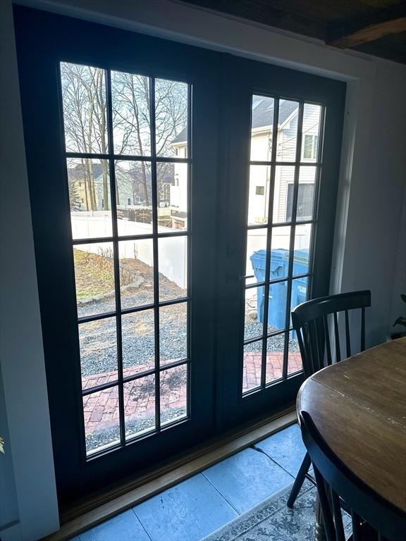 2208 Washington Street Canton, MA 02021 - Photo 6 of 15 a view of a dining room with furniture and windows