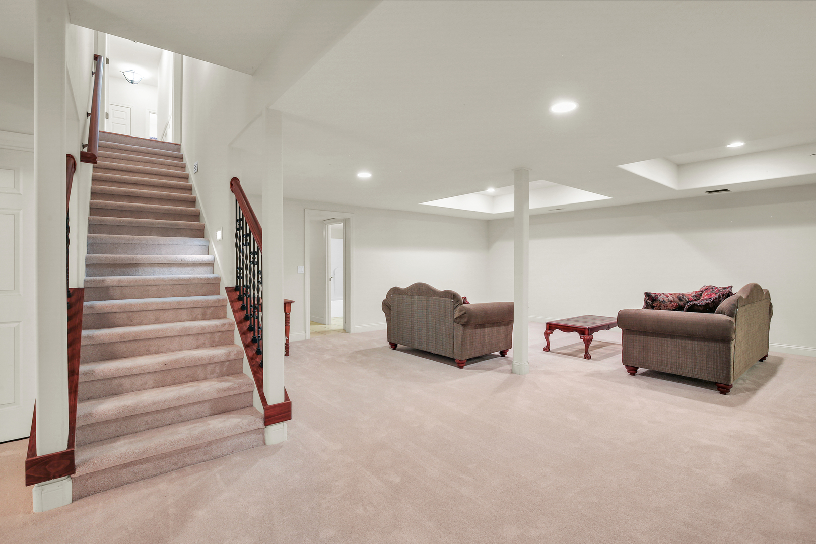 2202 Strand Drive Champaign, IL 61822 - Photo 33 of 62 a living room with furniture and a ceiling fan