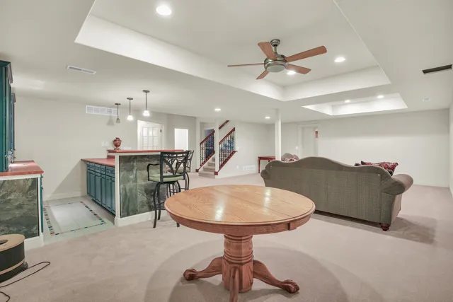 a kitchen with a sink and a refrigerator