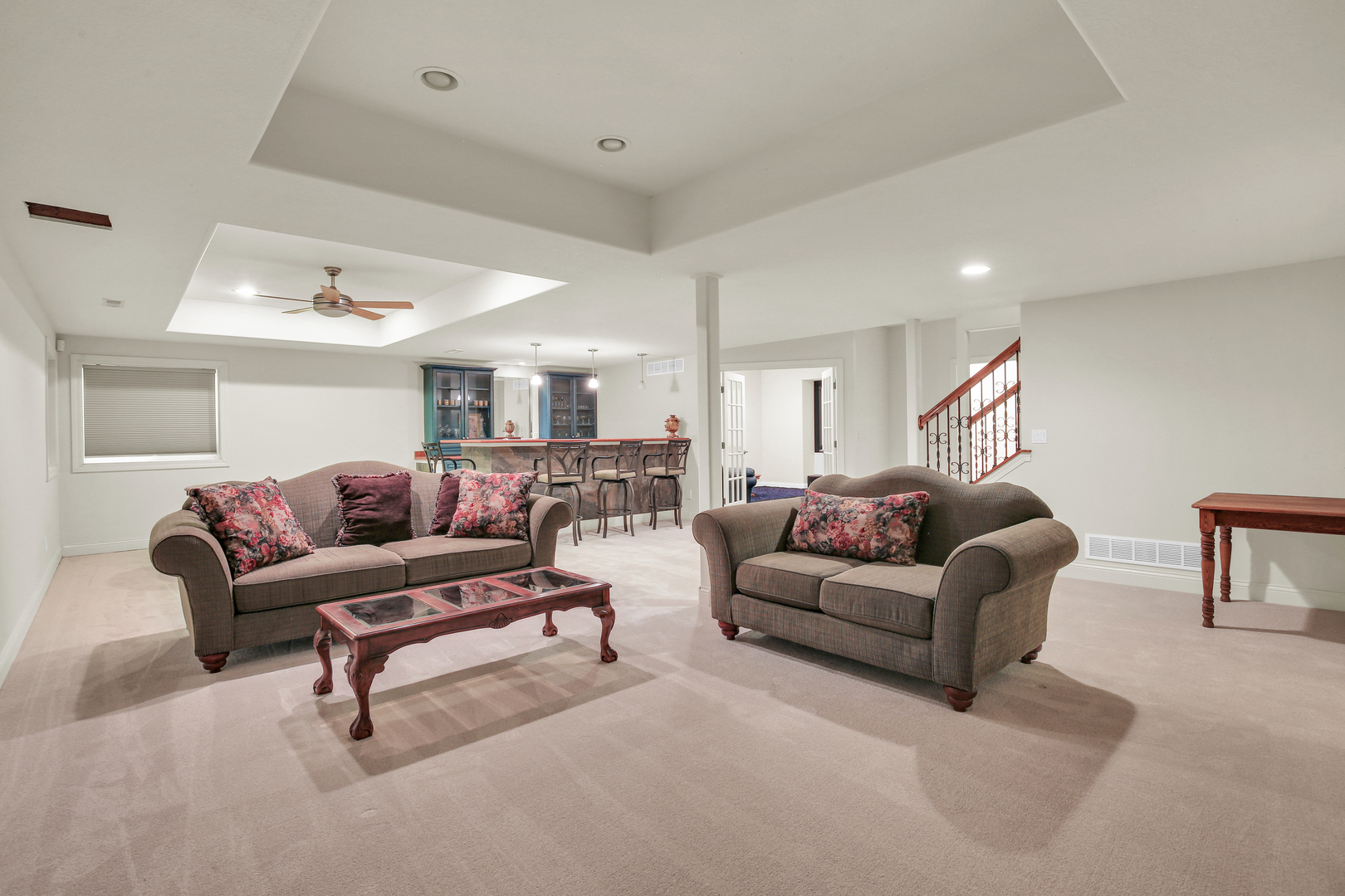 2202 Strand Drive Champaign, IL 61822 - Photo 35 of 62 a living room with furniture and a ceiling fan