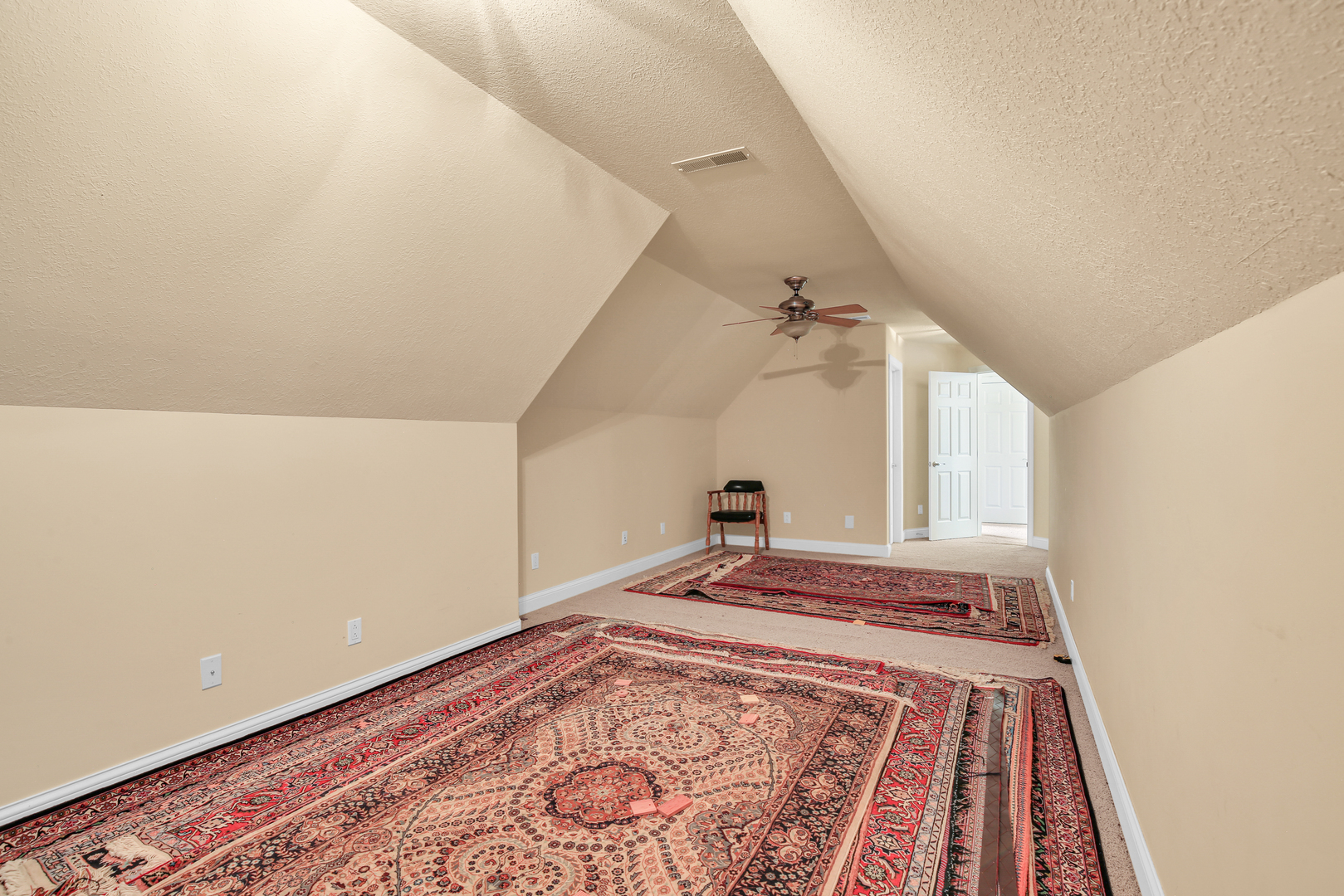 2202 Strand Drive Champaign, IL 61822 - Photo 53 of 62 a view of a bedroom with a bed and wooden floor