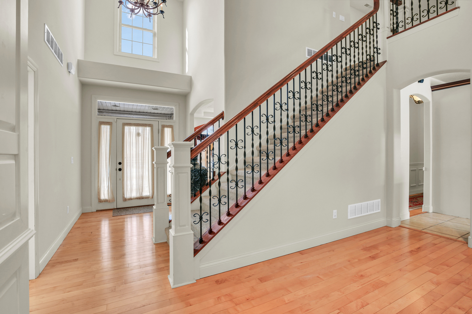 2202 Strand Drive Champaign, IL 61822 - Photo 8 of 62 a view of an entryway with wooden floor