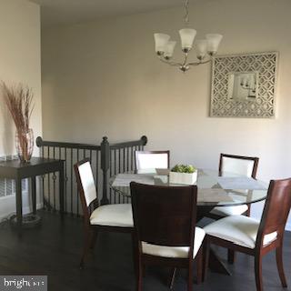 9563 Watts Road Owings Mills, MD 21117 - Photo 4 of 17 Elegant dining space with modern charm.